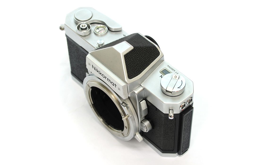 Nikon F system, which included the Nikon Nikkormat cameras