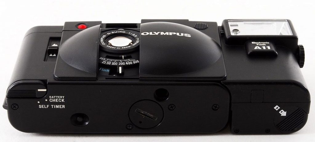 The Olympus XA series of cameras were compact cameras