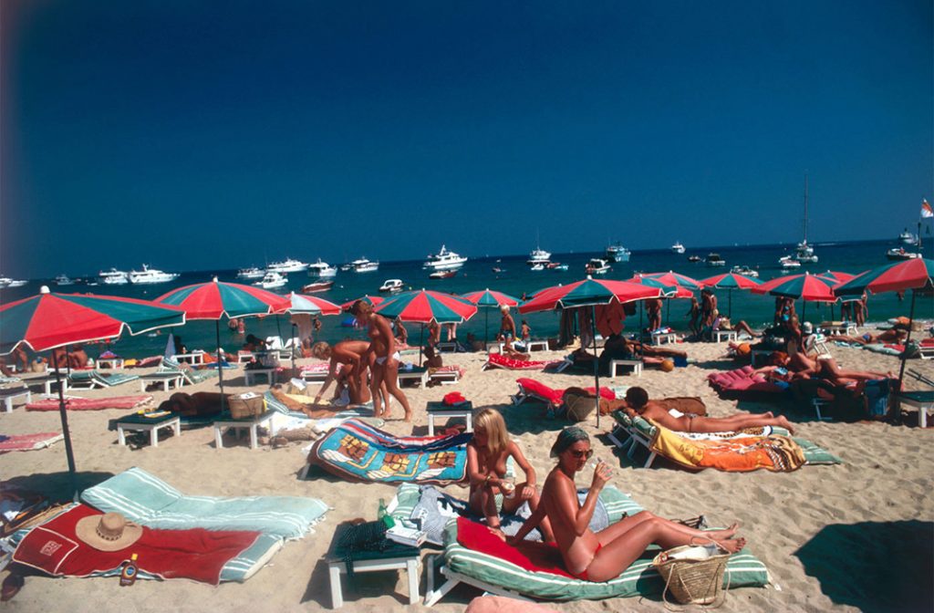 Slim Aarons work from the 50s thru 70s is photographing attractive people.