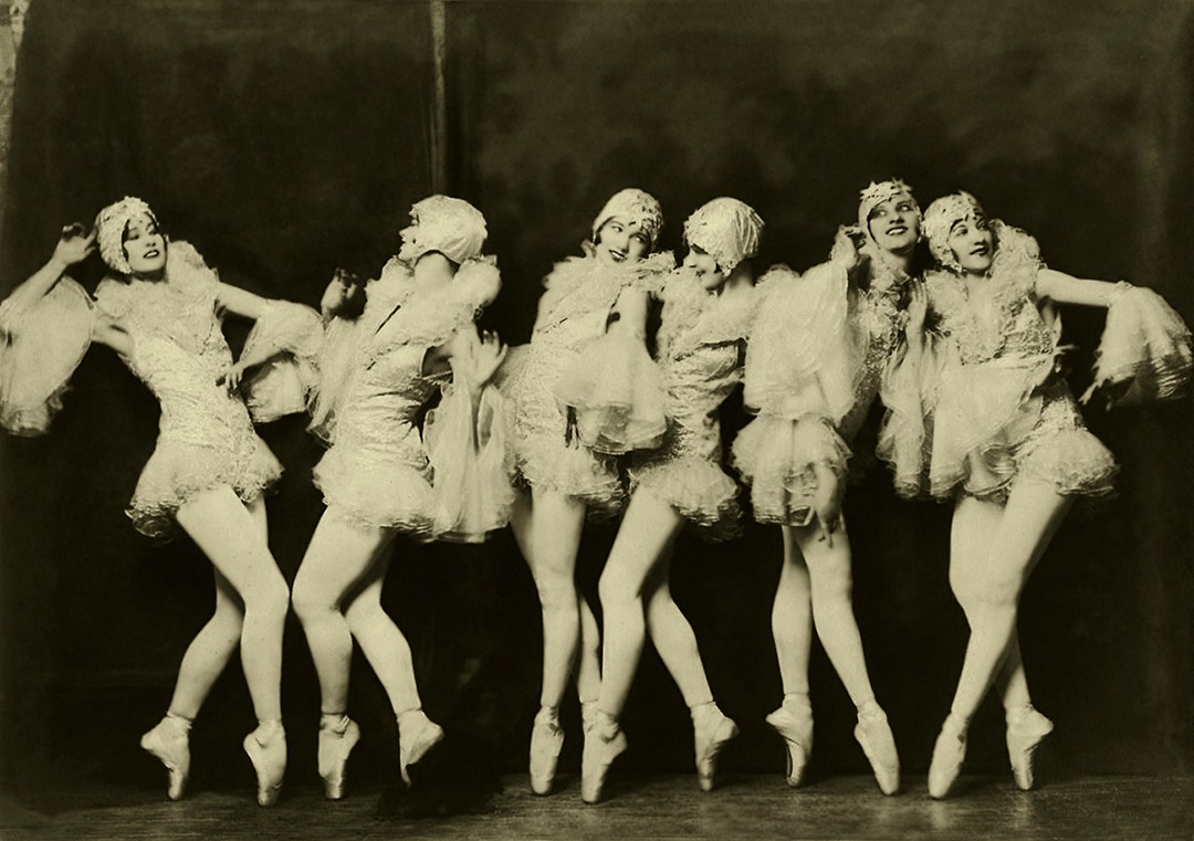 Ziegfeld Follies Showgirls posing in daring, nude images. 